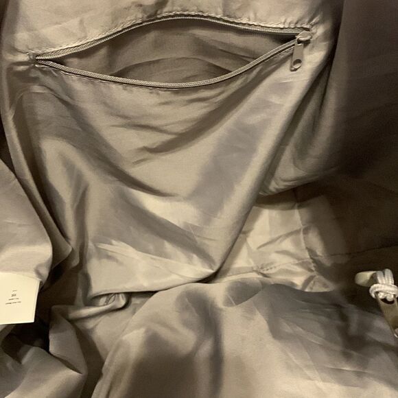 Large gray tote with outside pockets all the way around including one zippered. - Picture 7 of 12